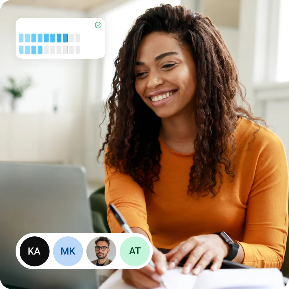 A learner smiling while working on her laptop, with a skills-progress card and her team's avatars overlaid on the photo